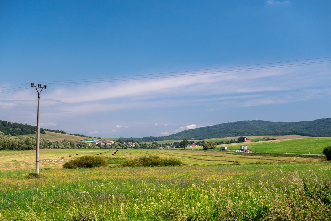 High Tatras mountains landscape in Slovakia with green valley and blue sky