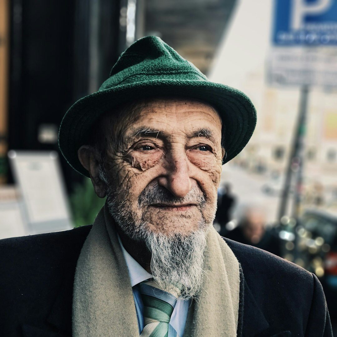 Portrait of a cheerful senior man with a moustache