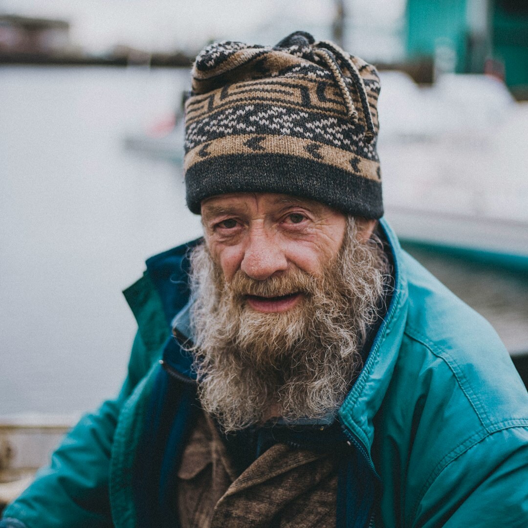 Portrait of a friendly senior man with a beard