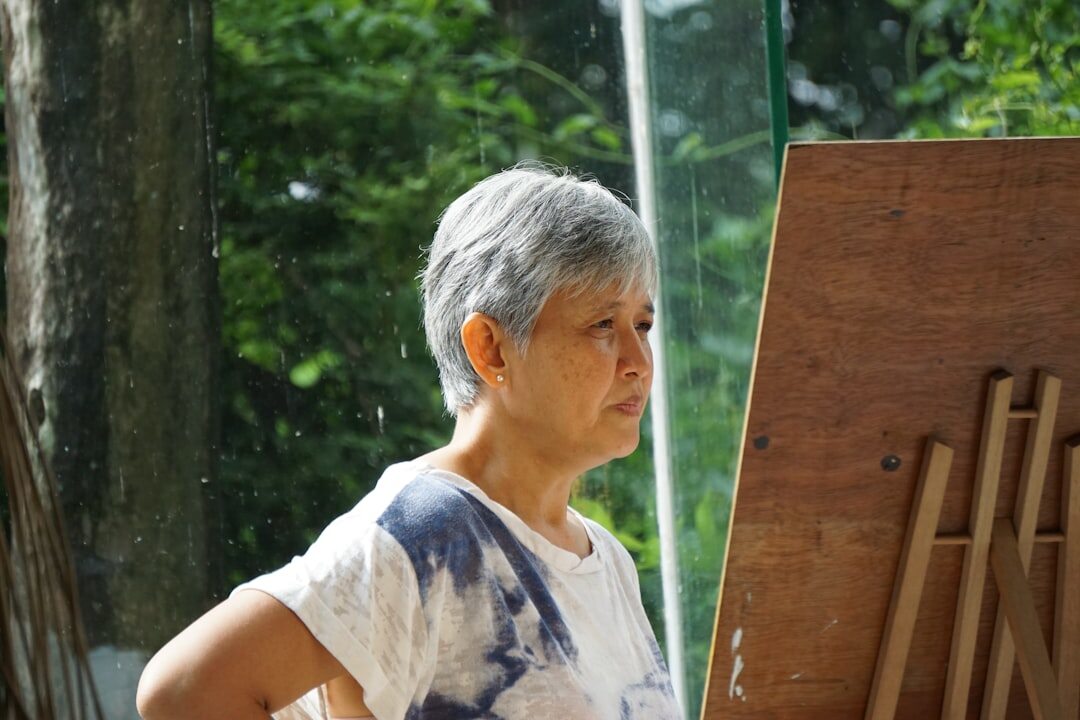 elderly woman painting
